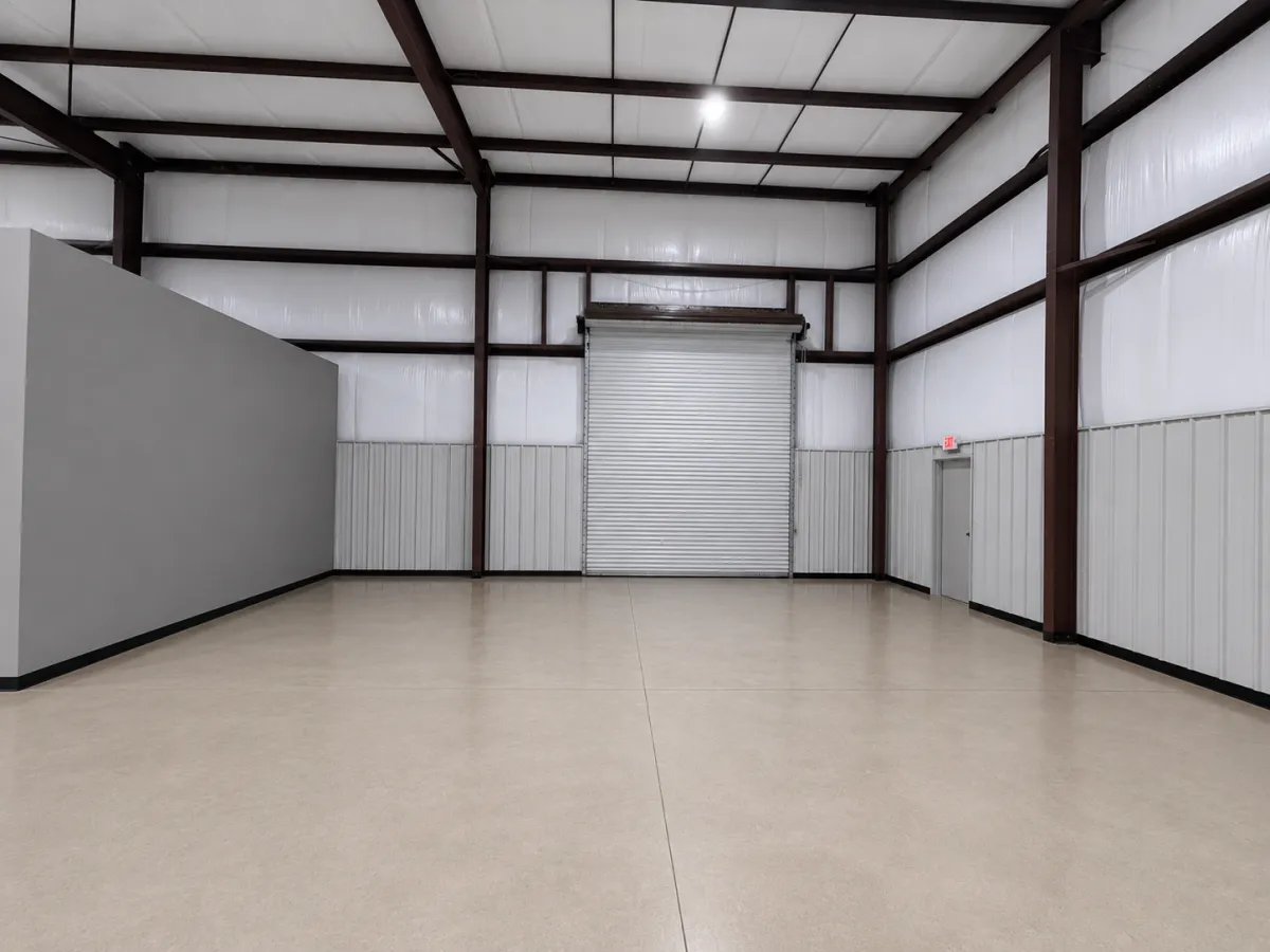 Interior with 14-foot drive-in door and office wall